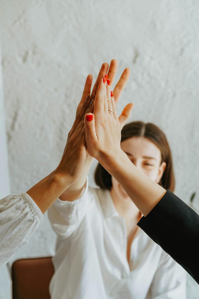 Group high-five gesture