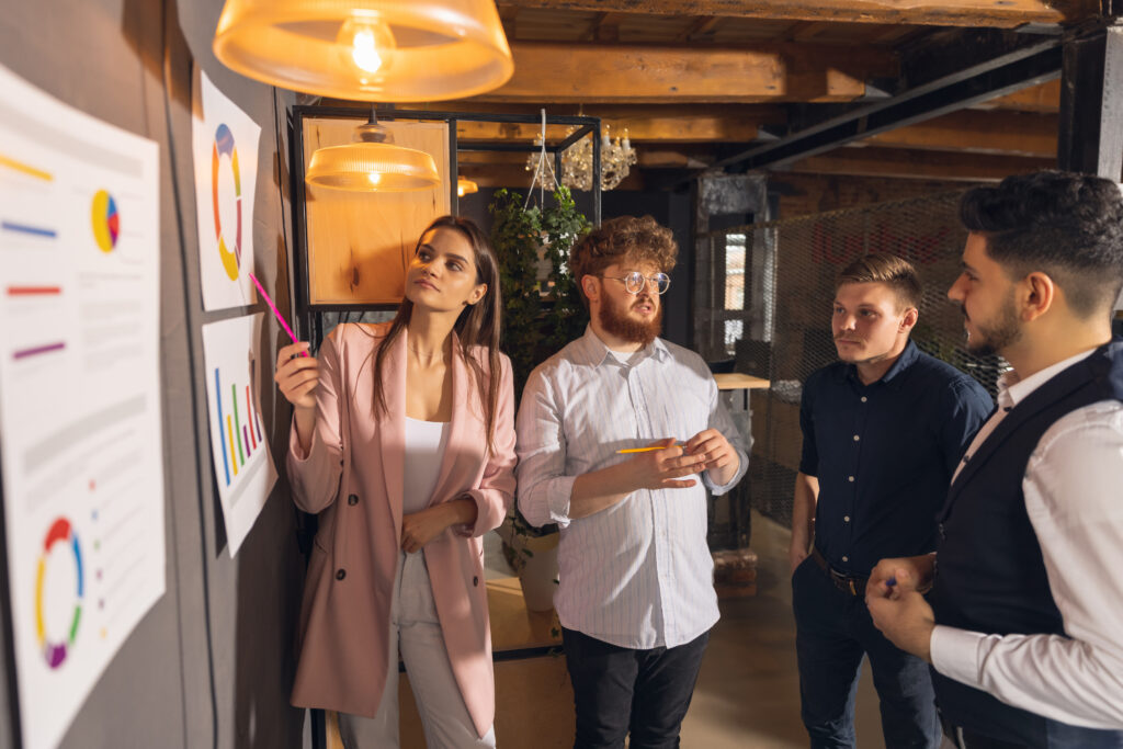Team analyzing charts during a strategy meeting